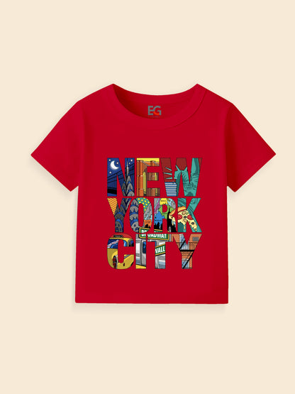 Red kids t-shirt featuring colorful New York City graphic text with iconic landmarks.