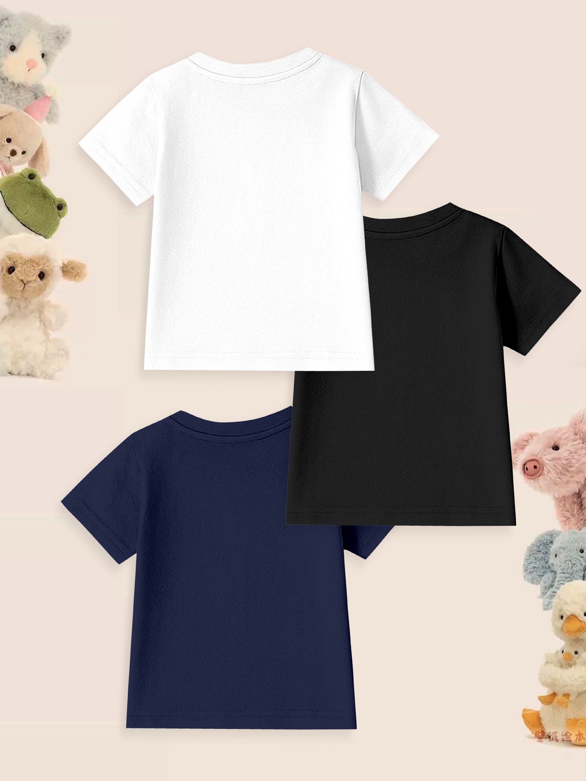 Three plain kids t-shirts in white, black, and navy with plush animal toys on pastel background
