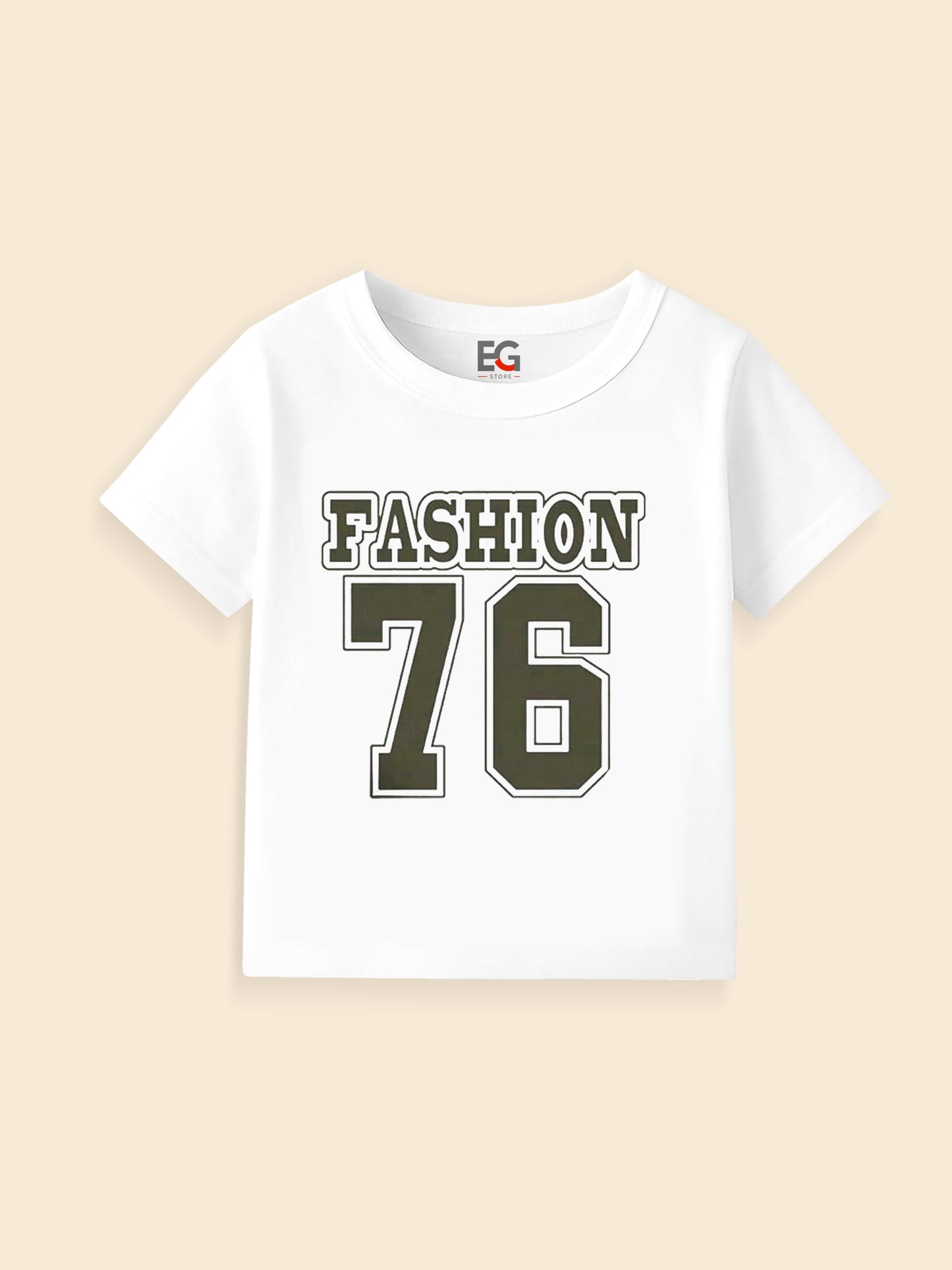 White kids' t-shirt with 'FASHION 76' print in bold olive letters, flat lay on beige background