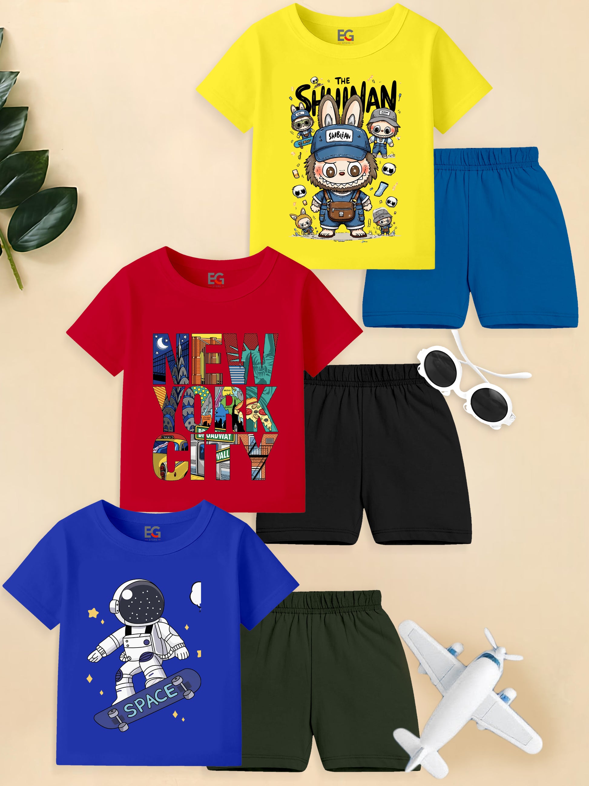 Kids graphic t-shirt and shorts sets featuring cartoon astronaut, NYC, and playful character designs