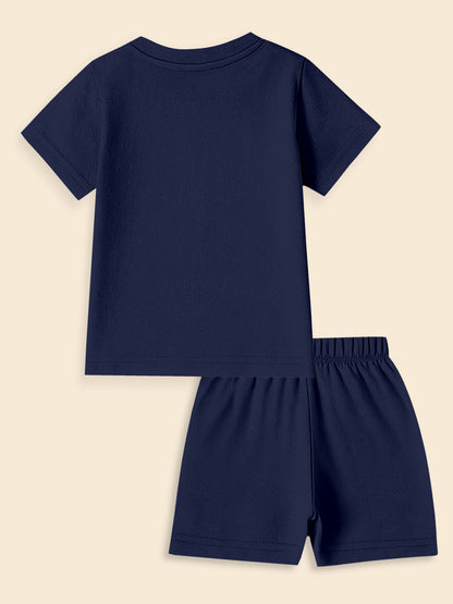 Navy blue short-sleeve kids t-shirt and elastic waist shorts set on beige background