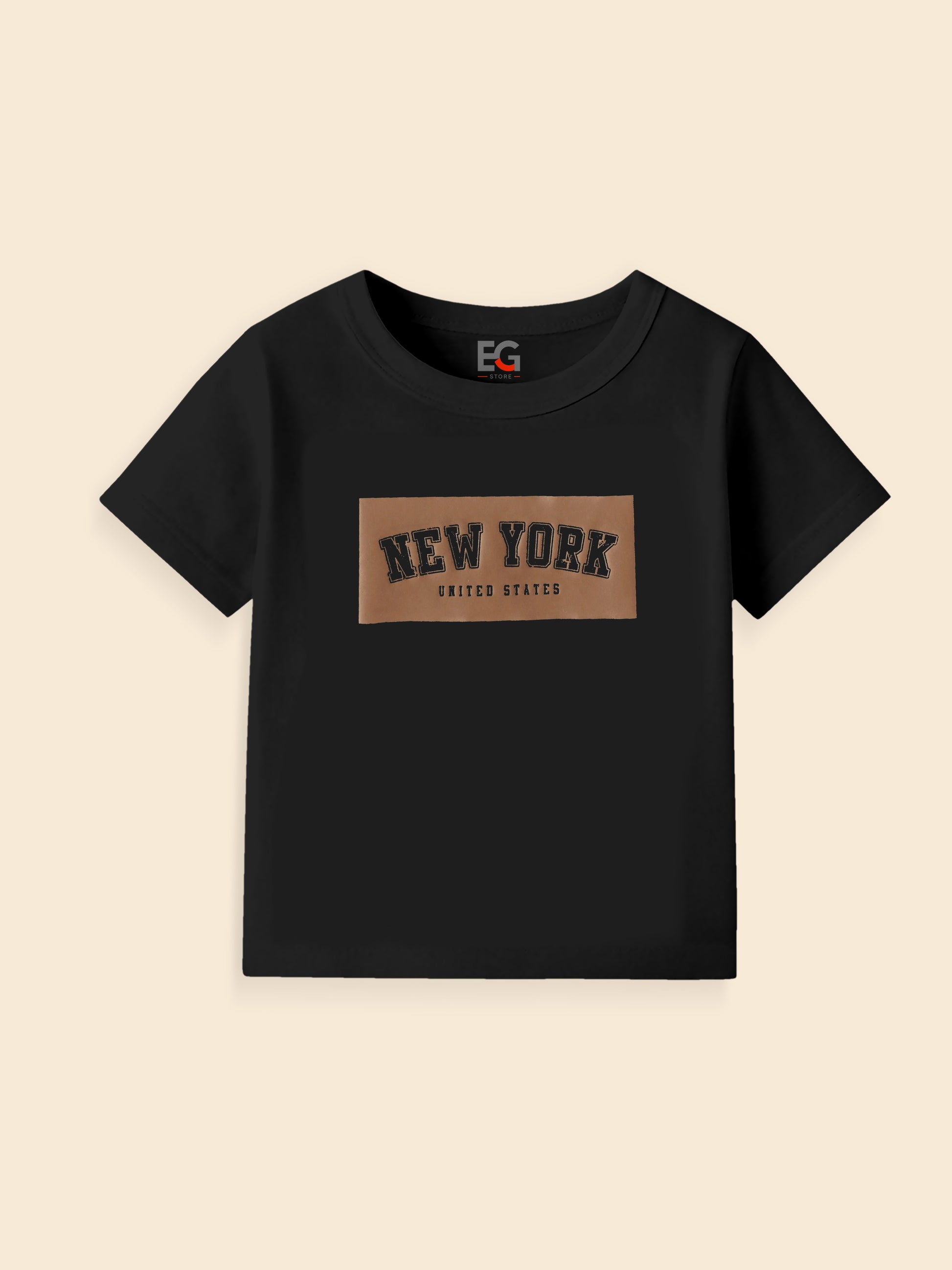 Black t-shirt with New York United States text on brown patch, laid flat on beige background