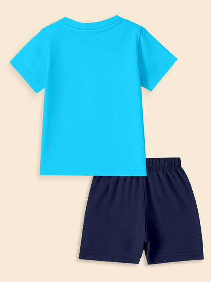 Children's clothing set with bright blue t-shirt and navy blue shorts, flat lay
