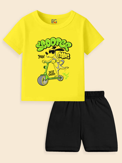 Yellow kids t-shirt with cartoon dog on a scooter and black shorts set