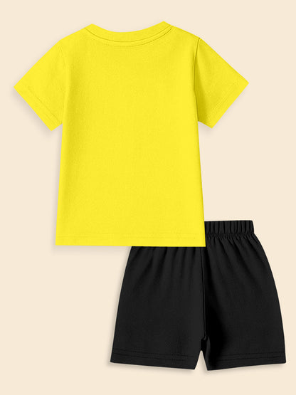 Yellow short-sleeve t-shirt and black shorts set on beige background