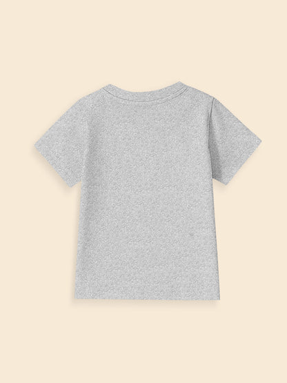 Back view of plain grey short sleeve t-shirt on beige background