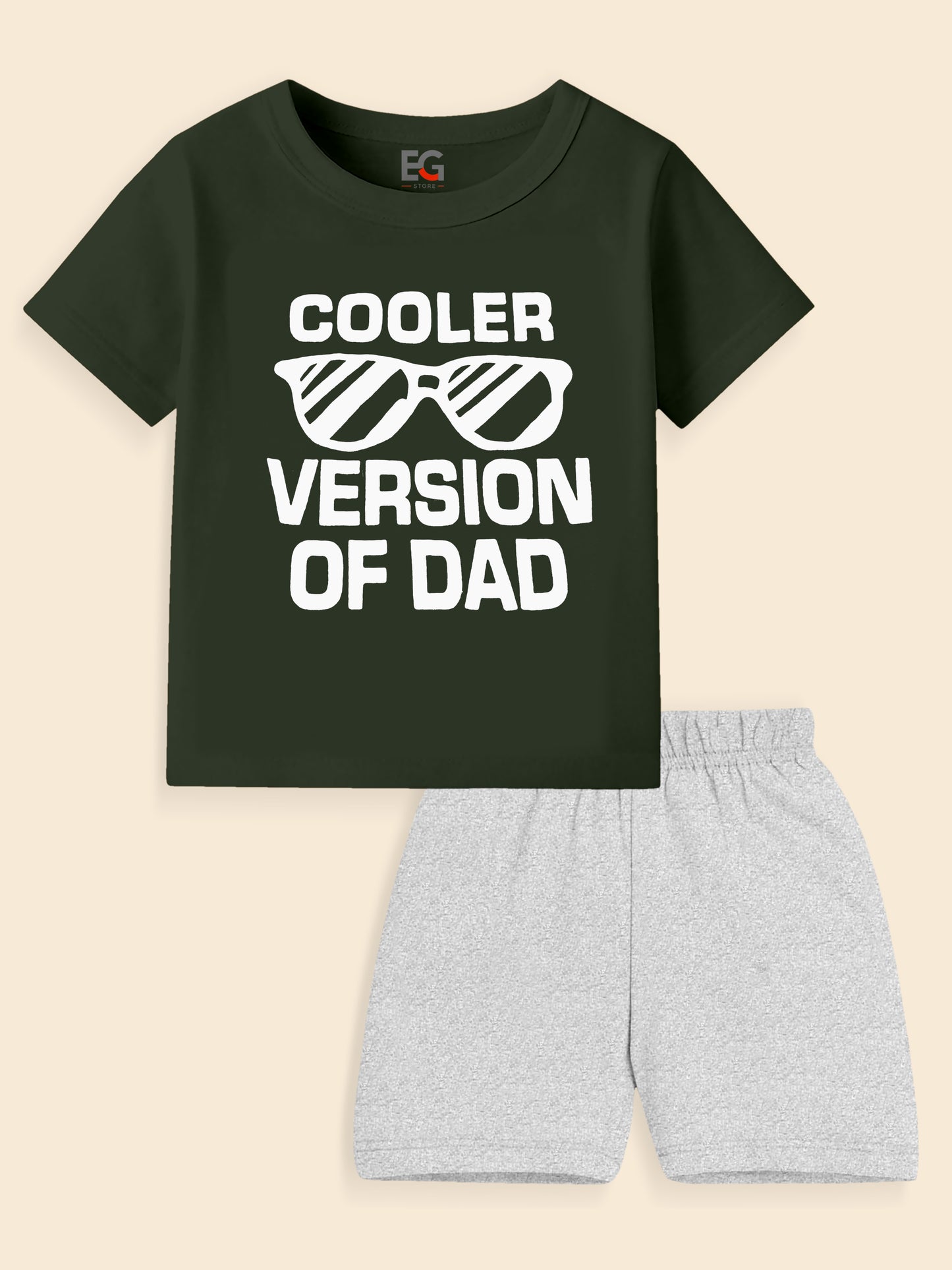 Kids outfit with black graphic t-shirt saying 'Cooler Version of Dad' and light gray shorts