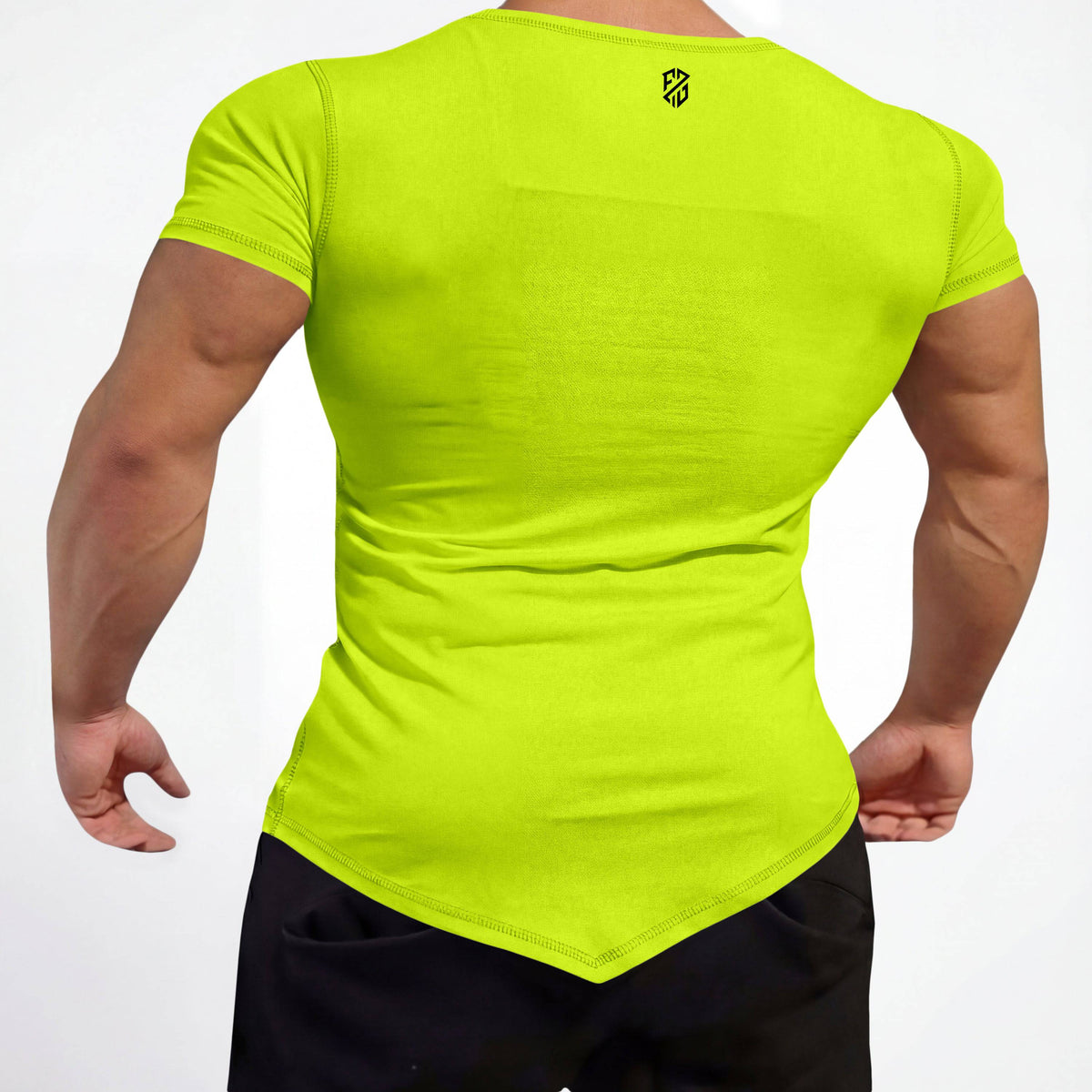 Man wearing bright yellow fitted athletic t-shirt with pointed hem and short sleeves