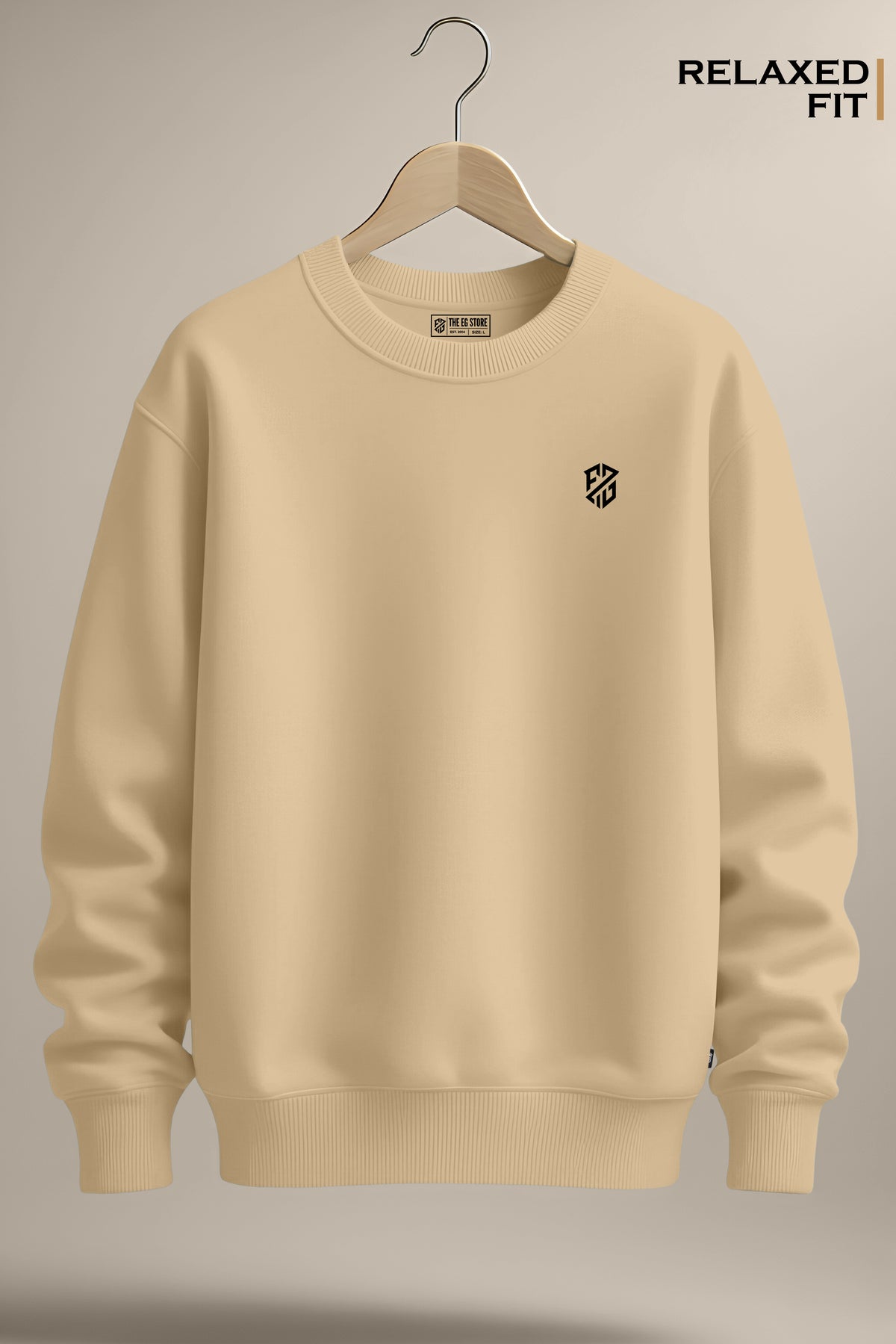 Beige relaxed fit sweatshirt with black chest logo, displayed on hanger