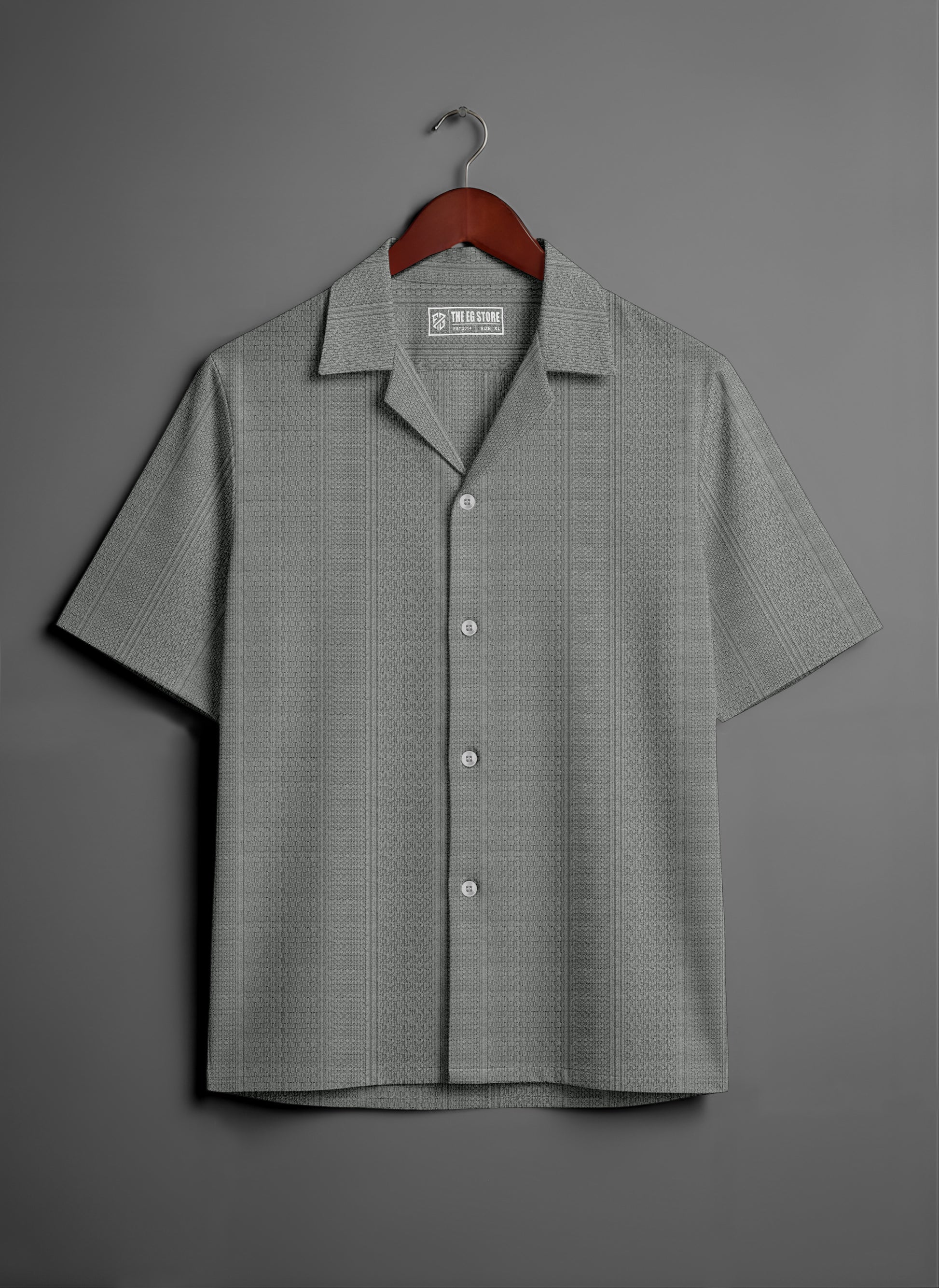 Gray short sleeve button-up shirt with subtle textured pattern on hanger