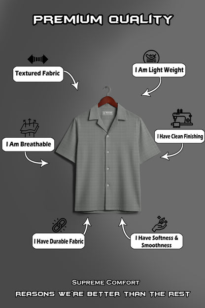 Grey short-sleeve textured fabric shirt on hanger, highlighting breathable, lightweight, durable, soft, smooth, and clean finishing features.