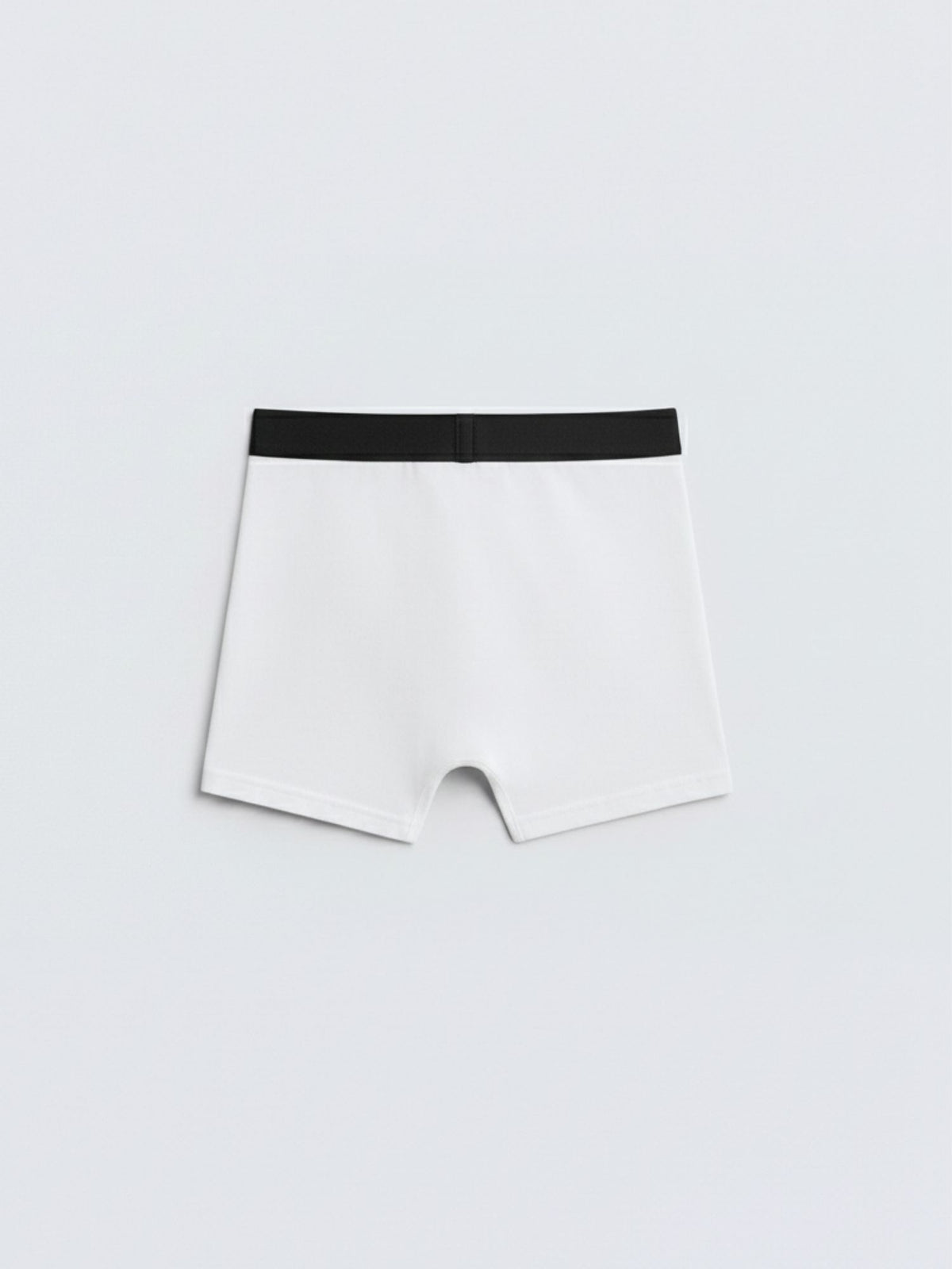 White boxer briefs with black waistband, back view on plain background