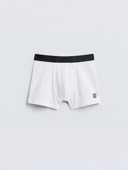 Men's white boxer briefs with black waistband and small logo on front, isolated on light background