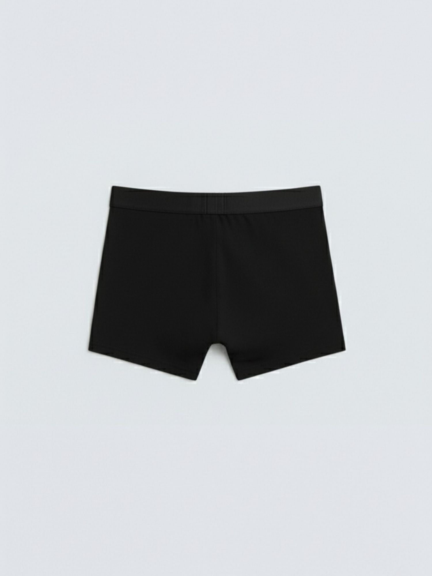 Black fitted men's boxer briefs on plain white background
