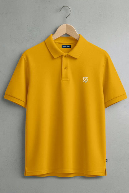 Yellow short-sleeve polo shirt with white chest logo, hanging on wooden hanger
