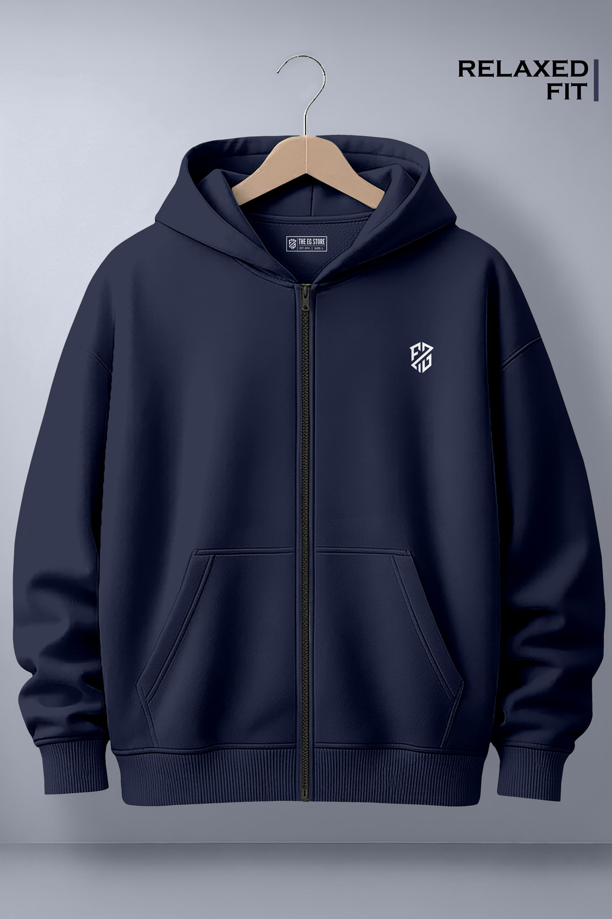 Navy blue zip-up hoodie with white chest logo, front pockets, and relaxed fit on hanger