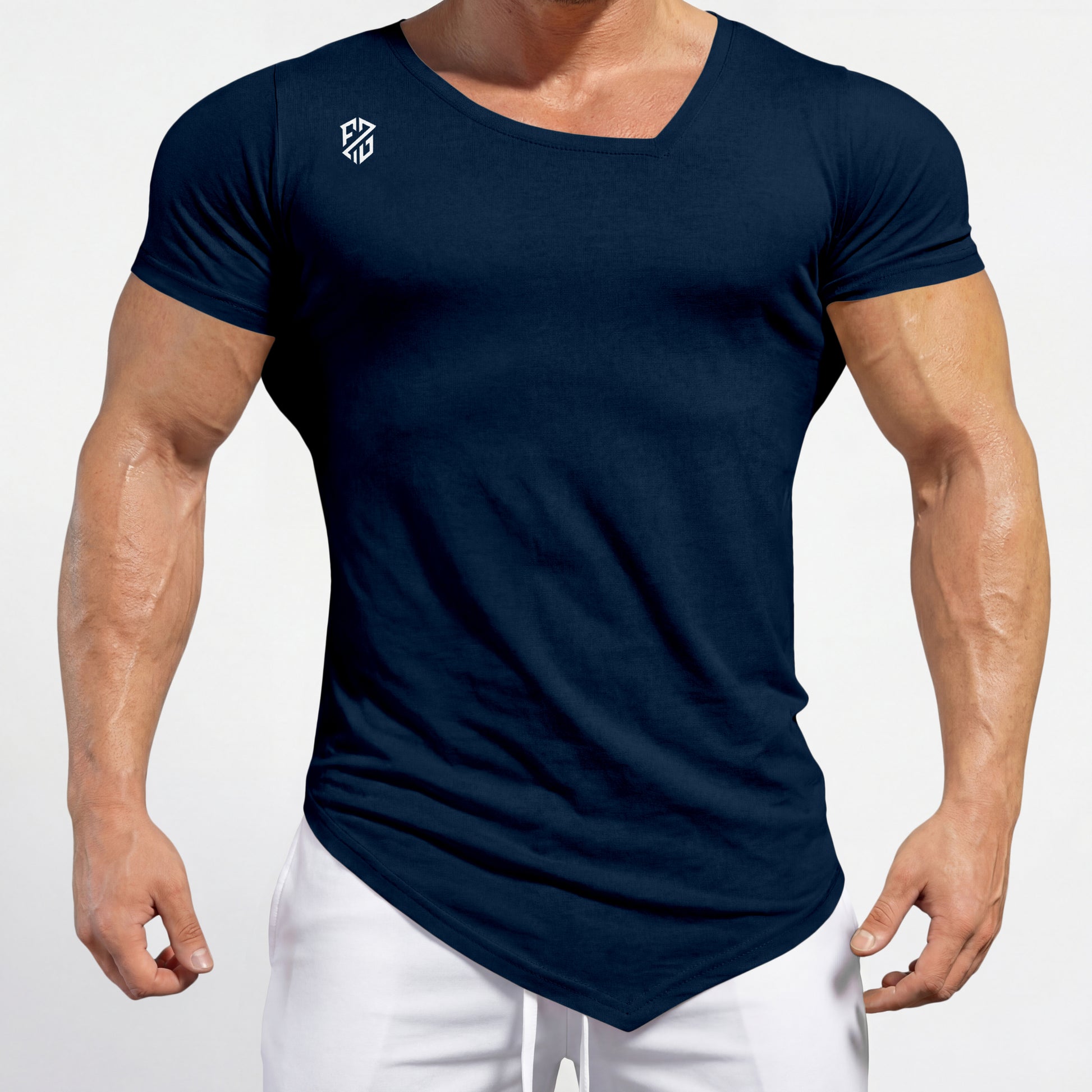 Navy blue fitted V-neck t-shirt with white logo, paired with white pants, on muscular male model