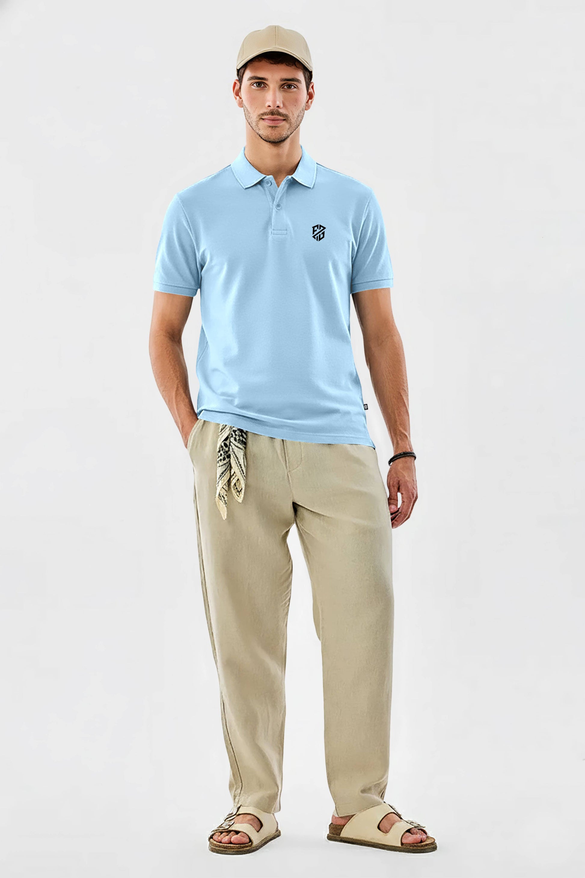 Man in light blue polo shirt, beige pants, sandals, and cap on white background