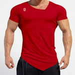 Athletic man wearing a fitted red t-shirt with white logo and black gym shorts