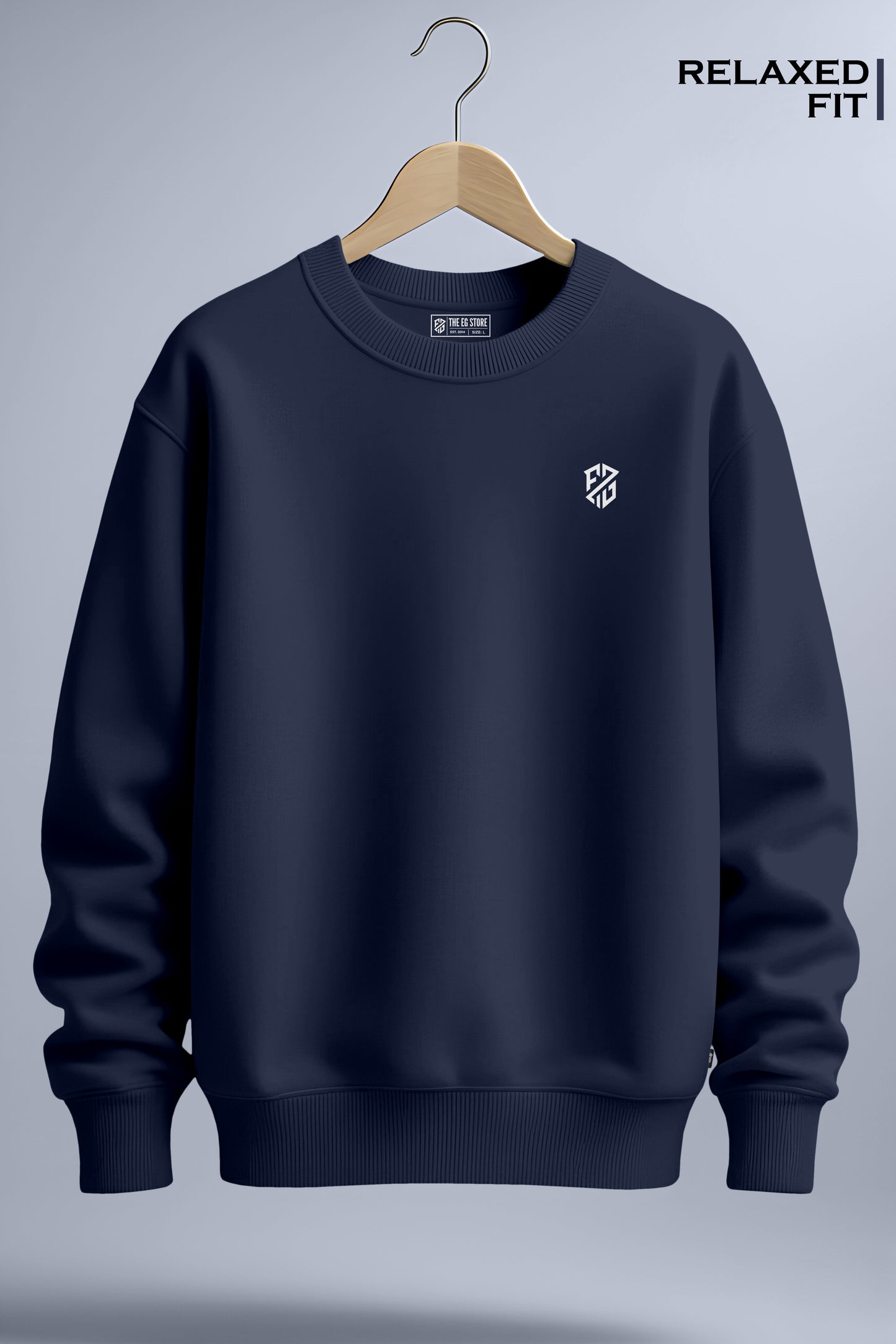 Navy blue relaxed fit crewneck sweatshirt with small white chest logo on hanger.