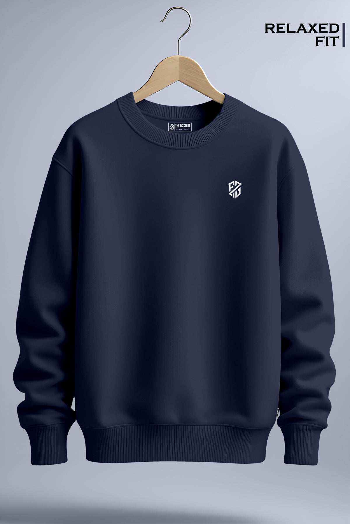 Navy blue relaxed fit crewneck sweatshirt with small white chest logo on hanger.