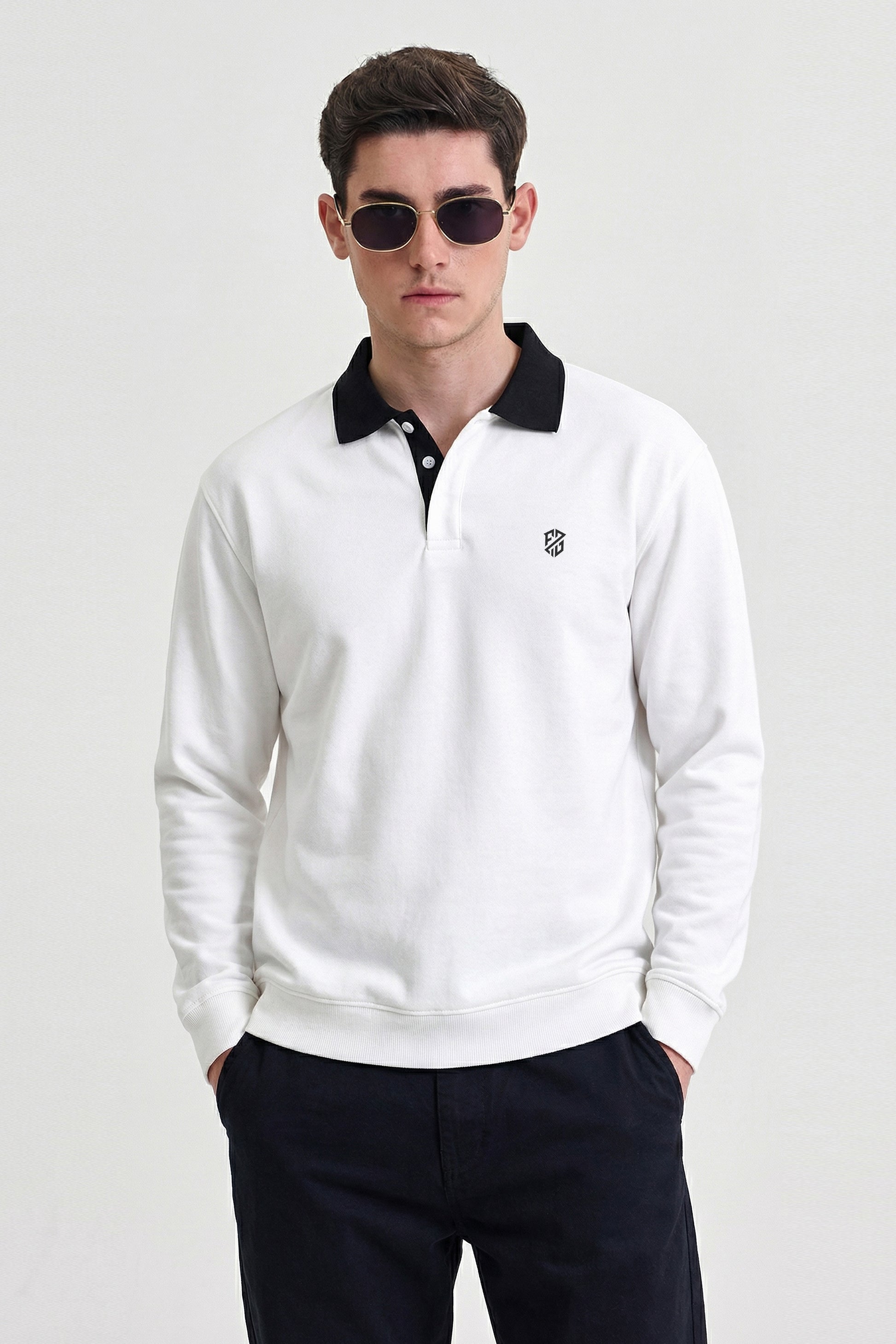 Man wearing white long sleeve polo shirt with black collar and sunglasses