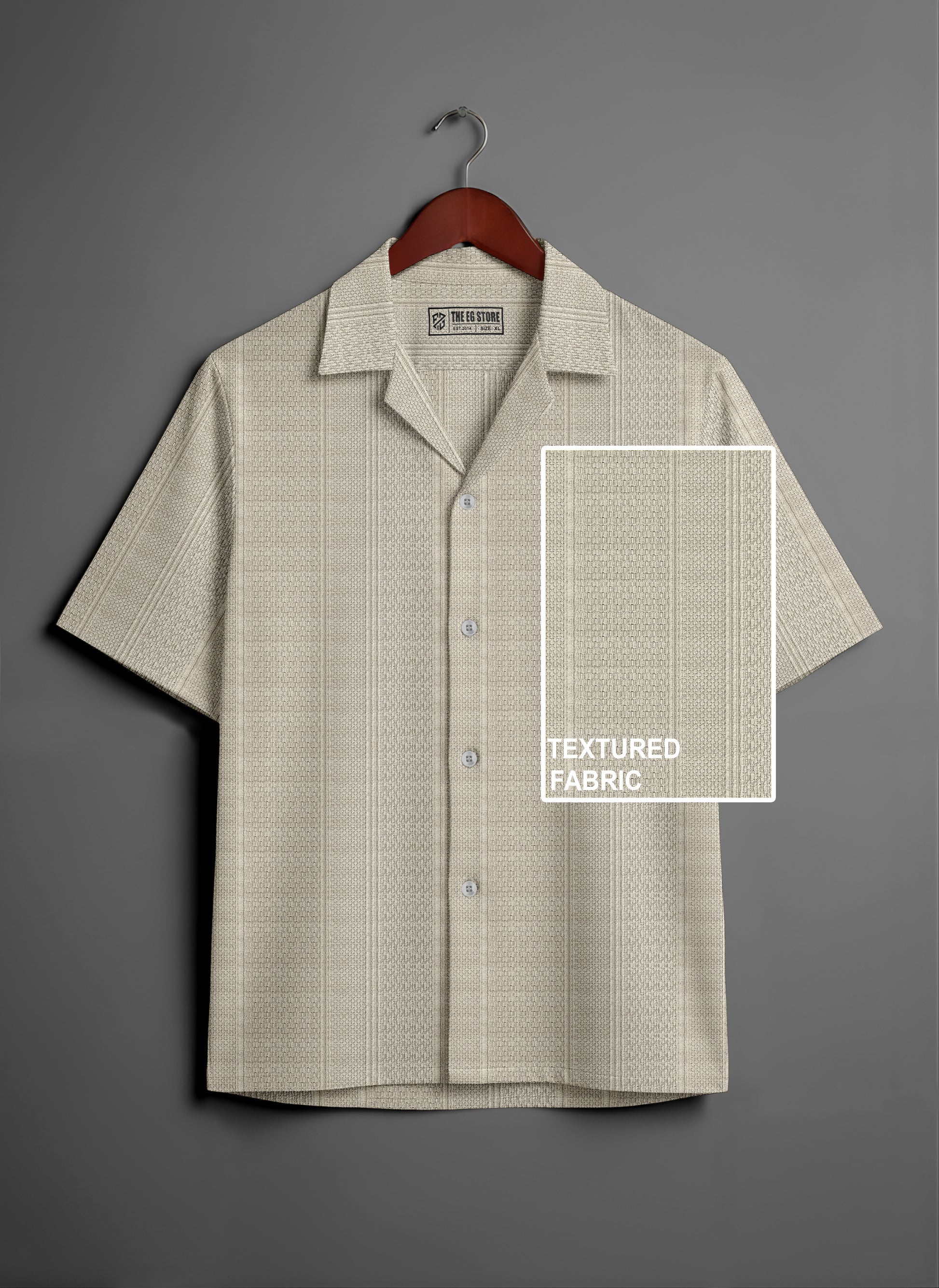 Beige short sleeve button-up shirt with textured fabric on wooden hanger
