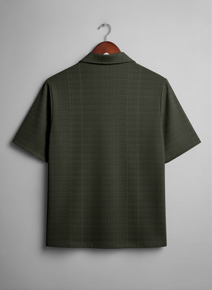 Back view of short sleeve dark green textured shirt on wooden hanger