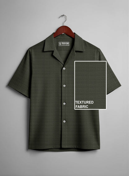 Relaxed fit olive textured knit Cuban collar shirt from THE EG STORE displayed on a model.
