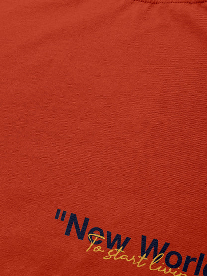 Rust orange t-shirt with printed text 'New World To start livi...'