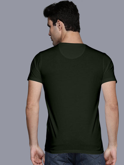Man wearing plain black t-shirt and jeans, shown from the back on a grey background