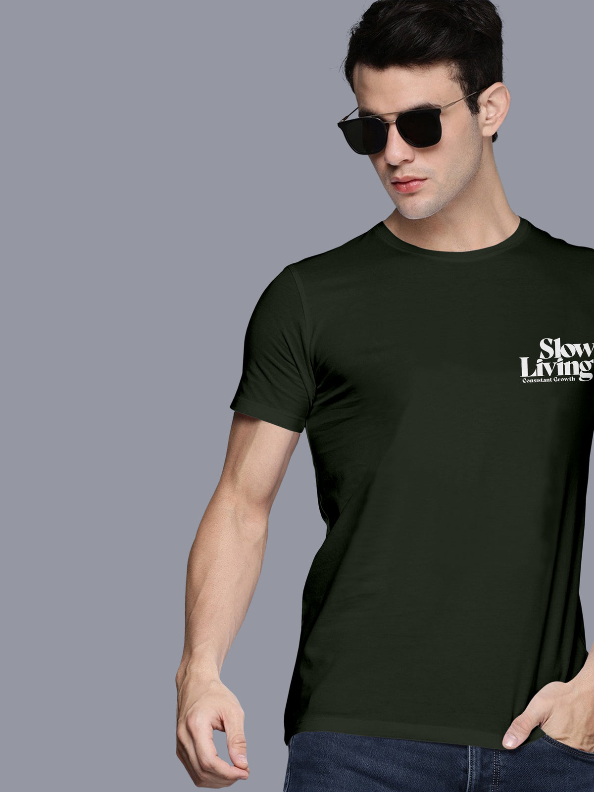 Man in sunglasses wearing a black t-shirt with 'Slow Living' text, casual fashion